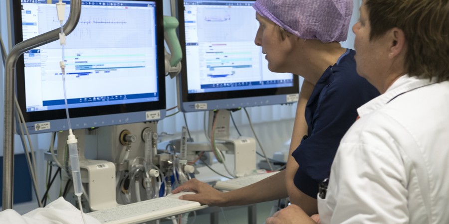 Two people working in a hospital