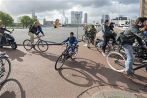 People on bicycles on their way to work