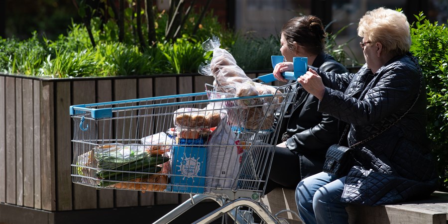 Ladies take a break after shopping