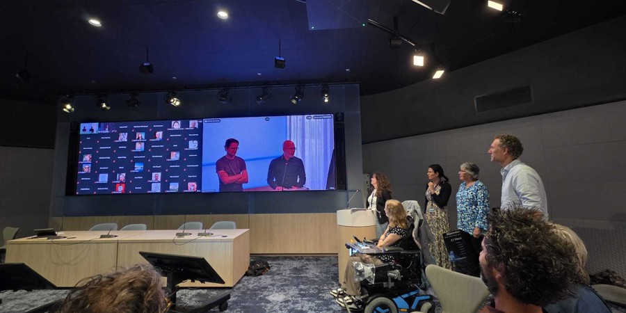 AI-Hackathon sessie in de CBS-zaal in Den Haag