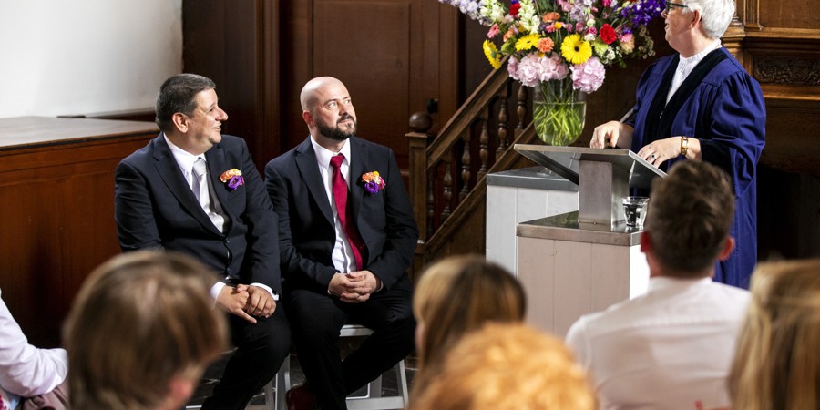 two men getting married