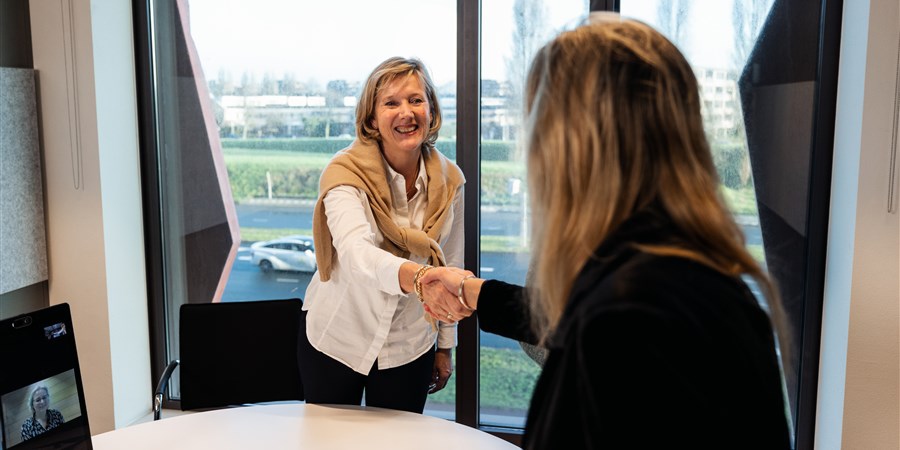 Recruiter shaking hands with candidate