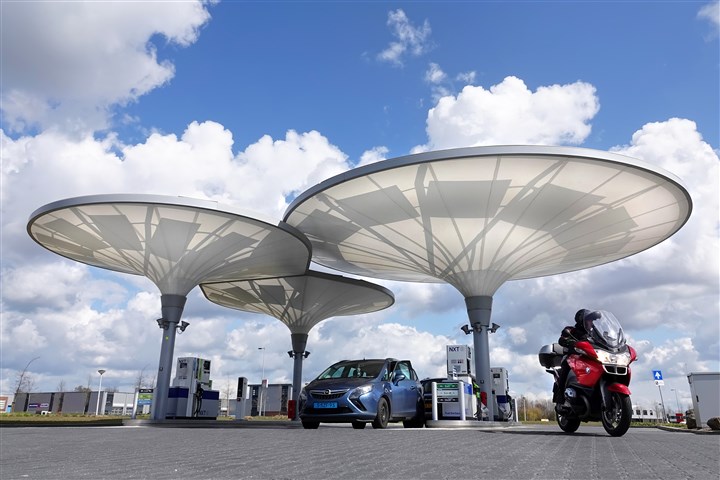 Motorcyclist leaves unusually shaped petrol station