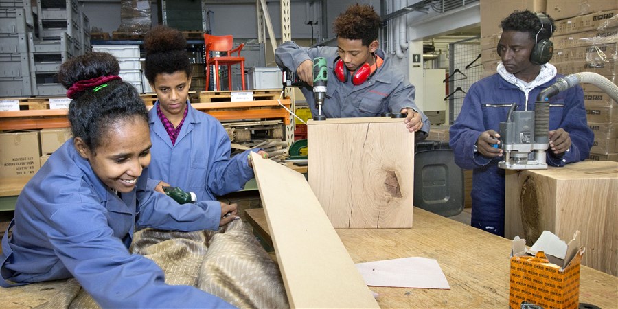 4 eritreese vluchtelingen op de leerwerkplaats van de Praktijkschool Breda